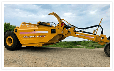 Parked Pulldozer 1220A scraper side view