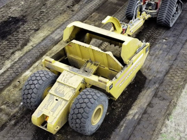 Bridgeview - Pulldozer 1220A scraper pan ejector