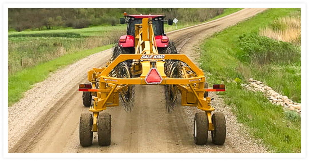 Rake working across ground
